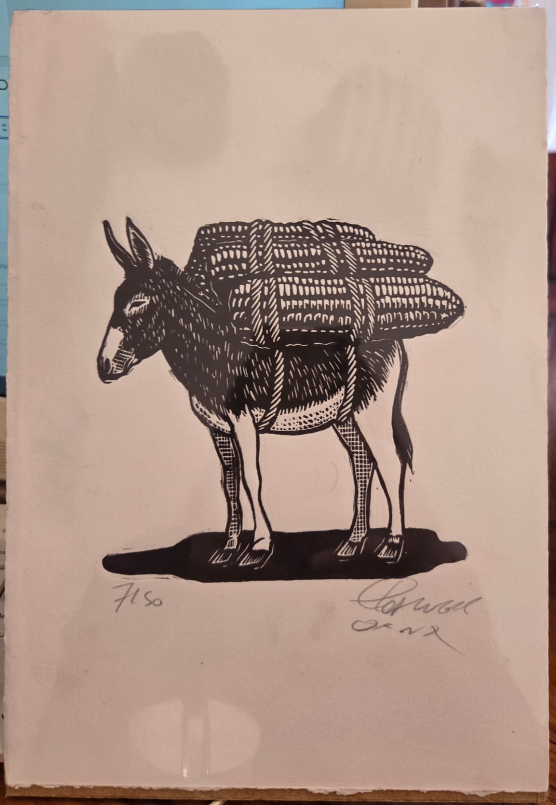 Grabado Burrito cargando maíz