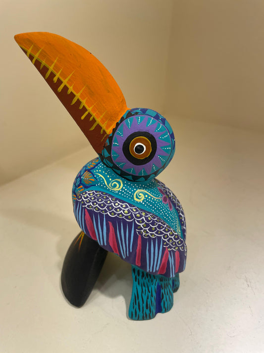Alebrije de tucán con iconografía zapoteca – San Martín Tilcajete Oaxaca